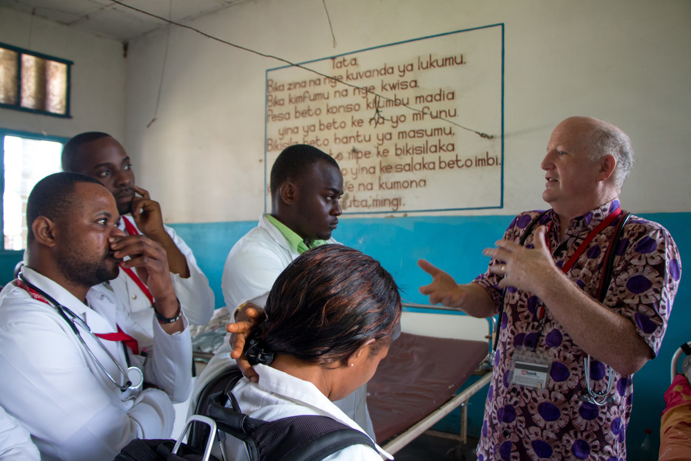 Dr. Tim Rice interacts with Vanga doctors. Photo by Mark & Kelly Hewes.