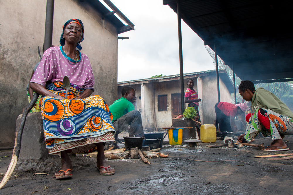 Family members prepare food for their loved ones who are being treated at Vanga Evangelical Hospital. Photo by Mark & Kelly Hewes.
