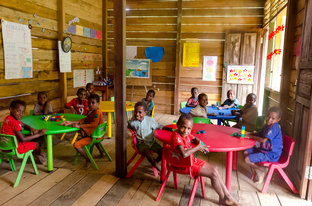 children receiving education in remote village Papua Indonesia Mission Aviation Fellowship