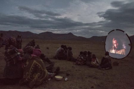 The "JESUS" film at twilight in Lesotho. Photo by Mark and Kelly Hewes.