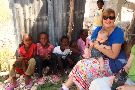 Kathy and Pete (as a baby) with those same kids, same location.
