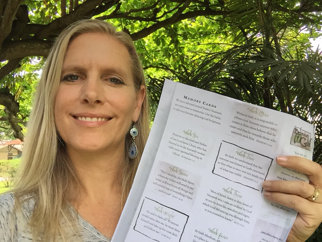 Linda triumphantly displays her finished color copies.