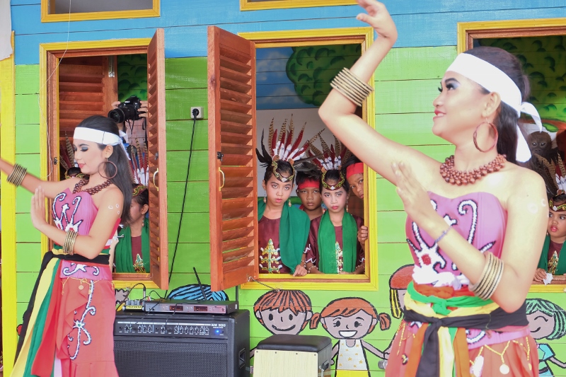 Traditional dancers during the library grand opening.