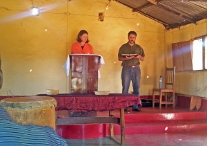 Jill Holmes speaking at her church in Mozambique.