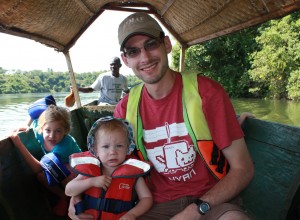 Taking a boat ride on the Nile during a family vacation to Jinja, Uganda.